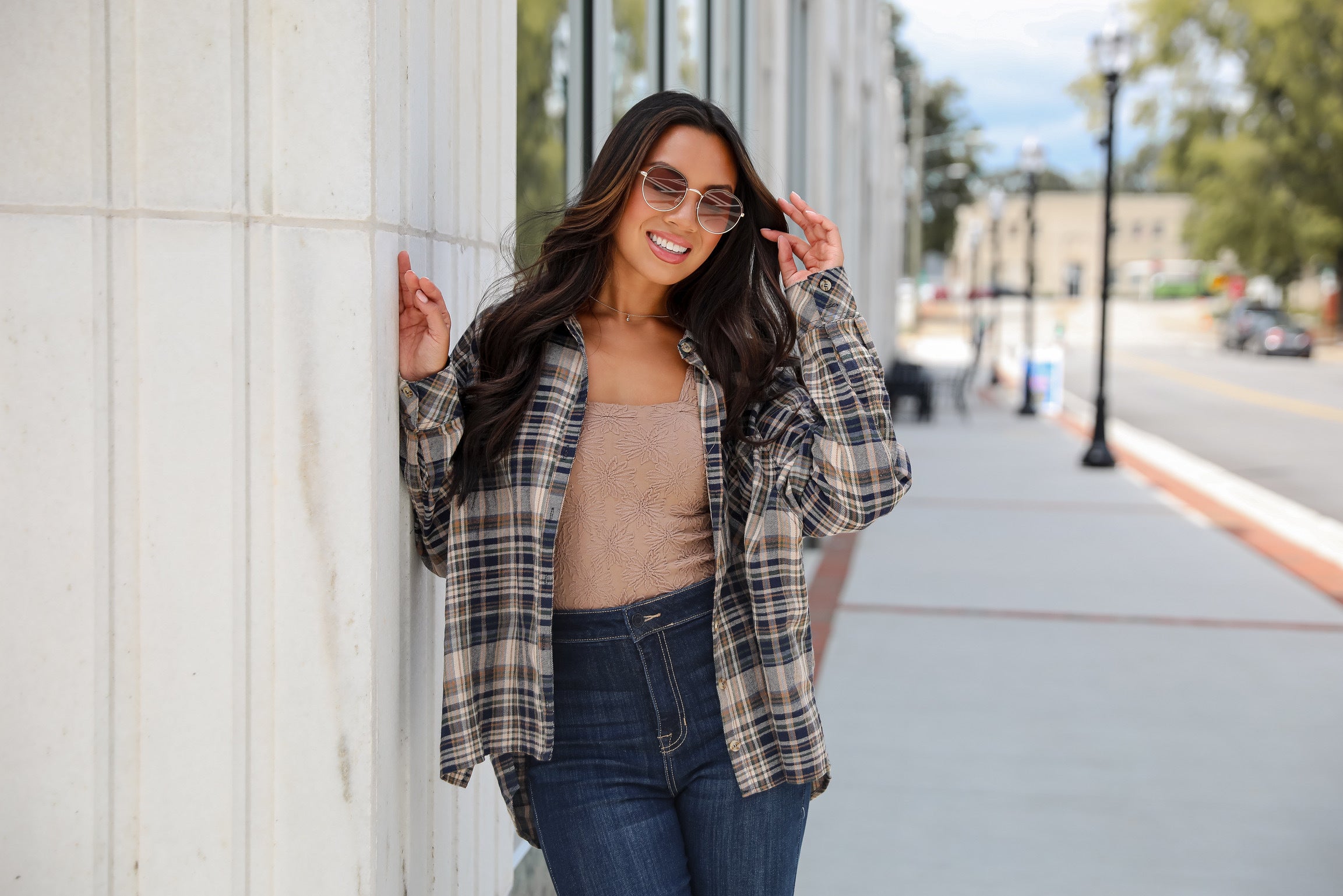 model wearing cute fall flannel outfit