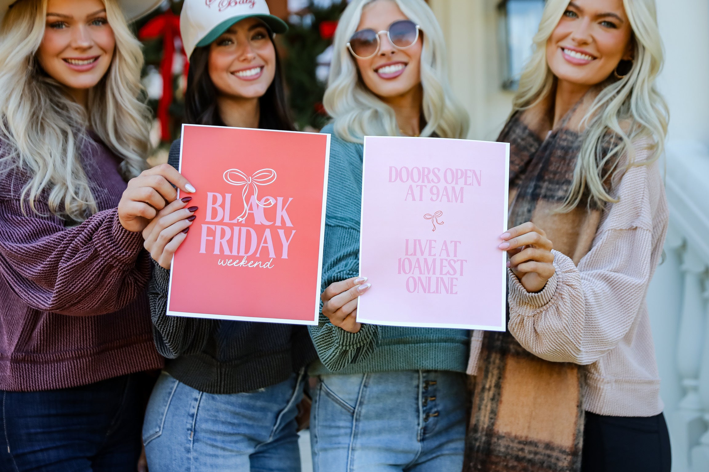 4 models wearing cute clothes for Black Friday