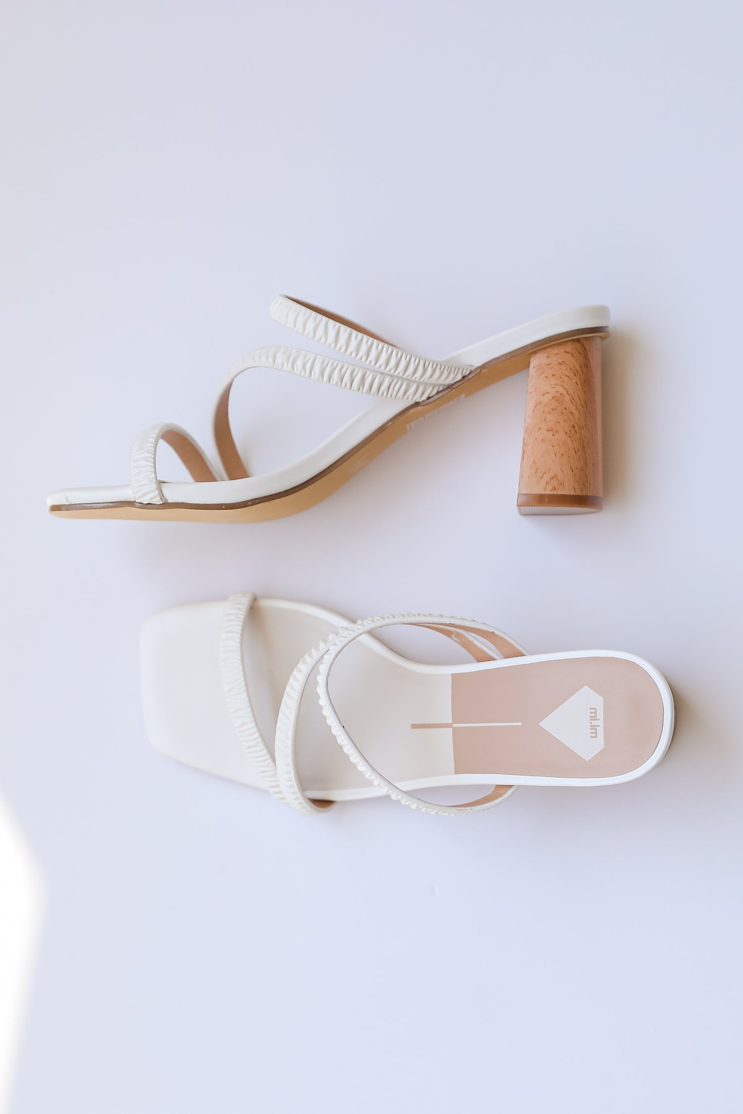 white Heels flat lay