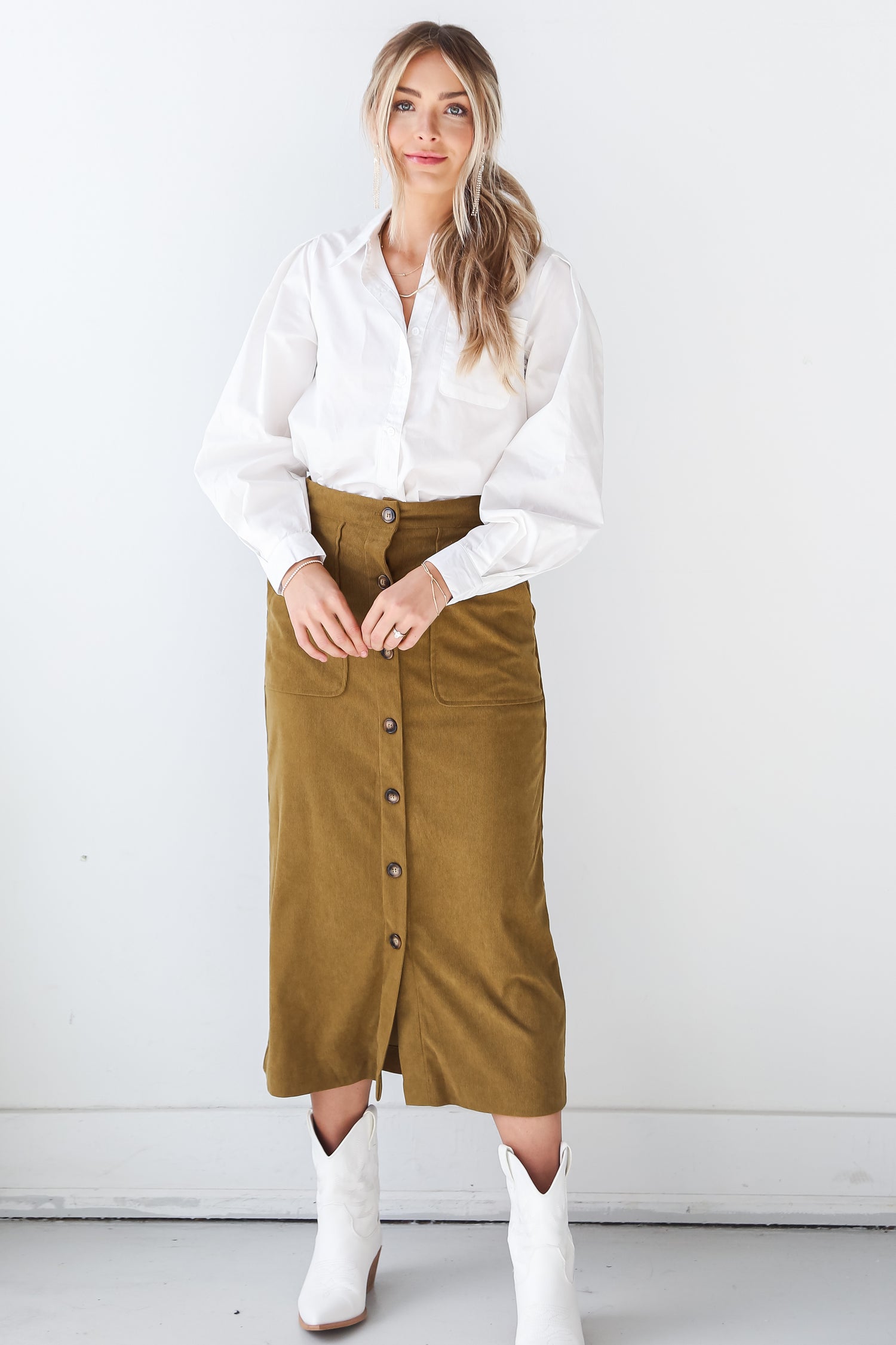 model wearing an Olive Corduroy Midi Skirt