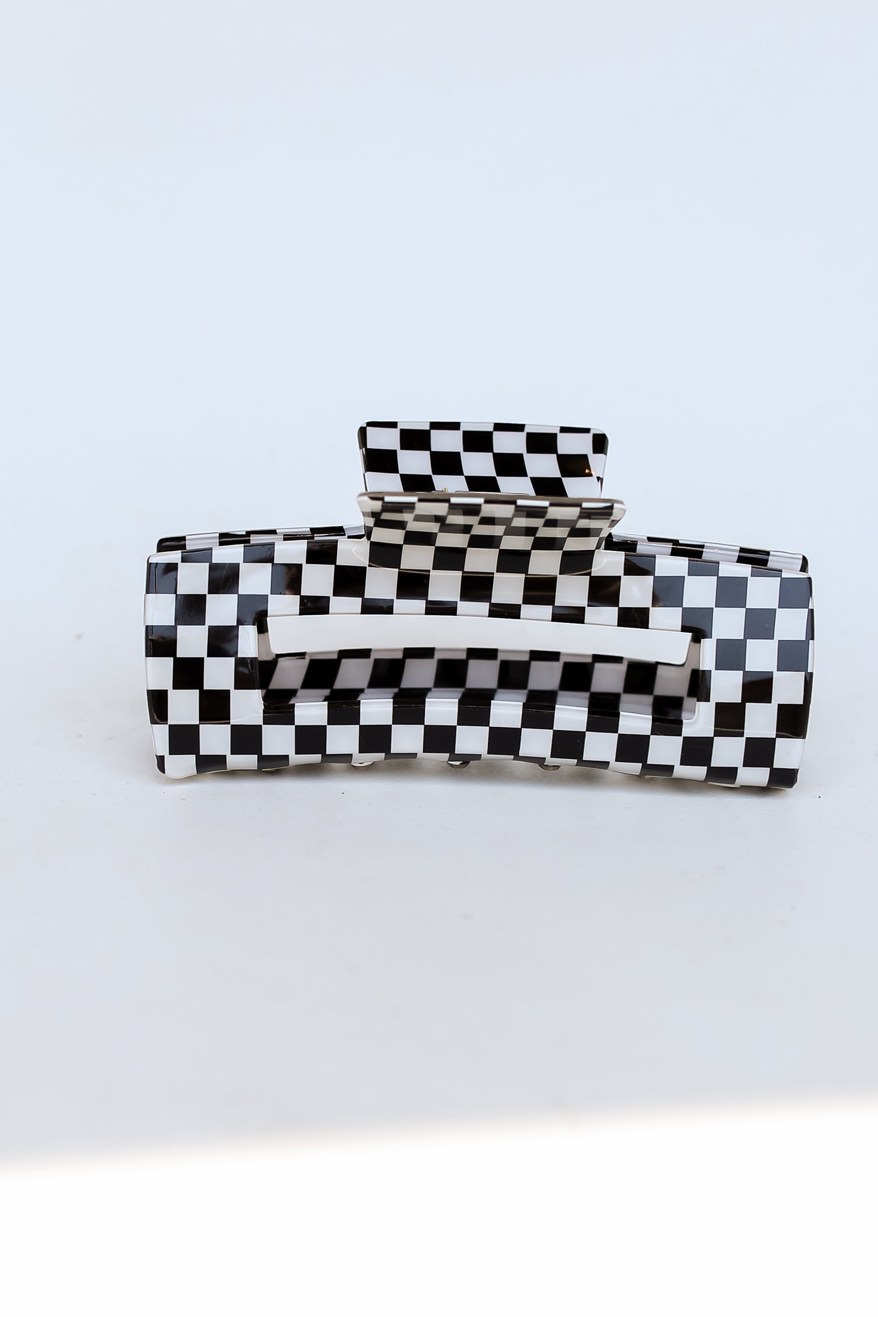 black Acrylic Checkered Claw Hair Clip flat lay