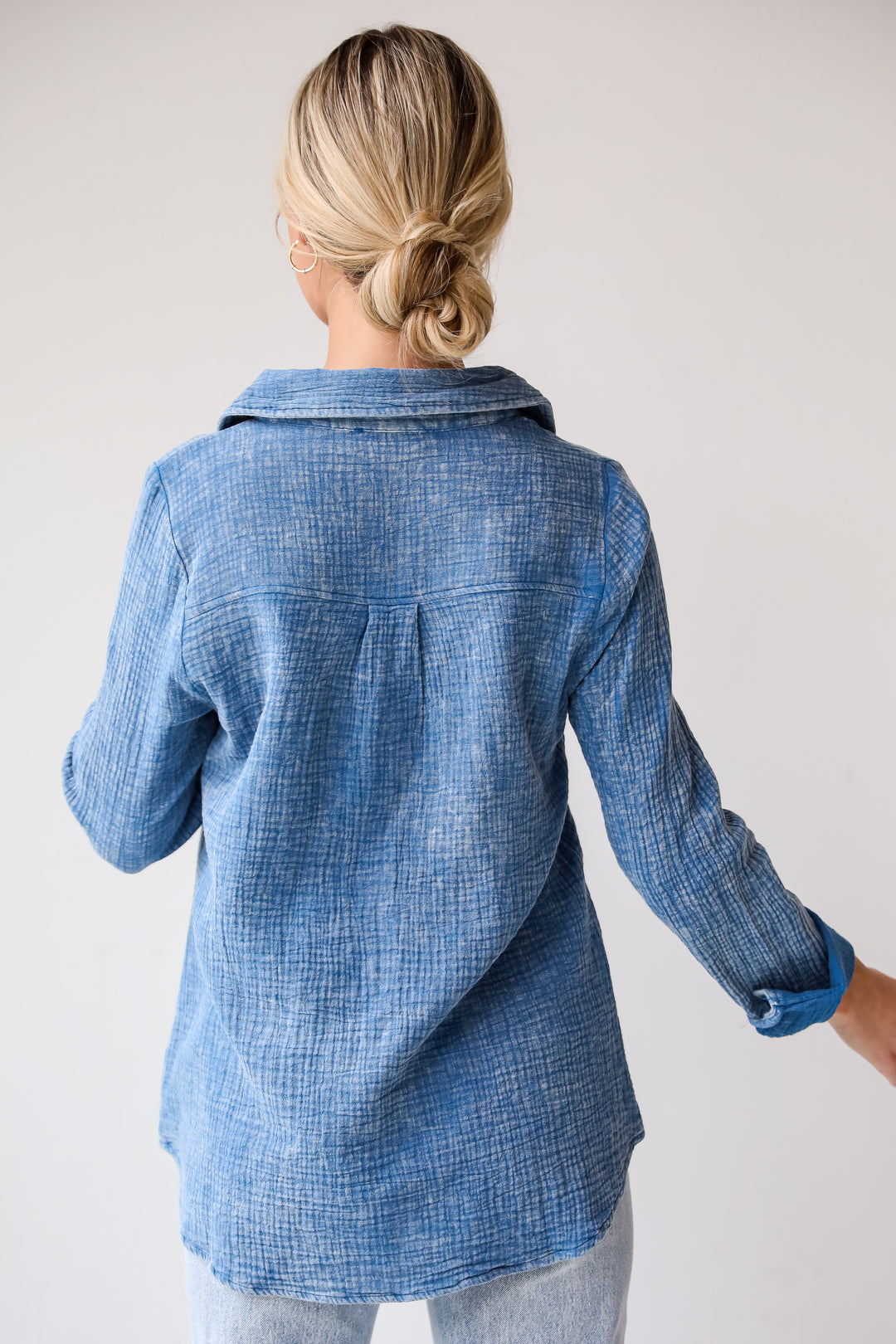 Morgan Denim Linen Button-Up Blouse features, Lightweight Crinkle Linen Fabrication, Acid Washed, Collared Neckline, Functional Button Front long Sleeves with Functional Button Cuffs