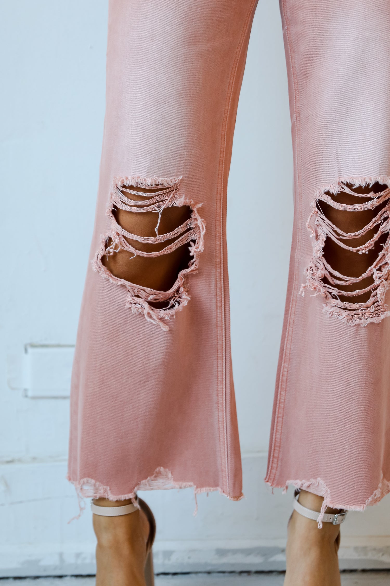 Mauve Distressed Flare Jeans close up