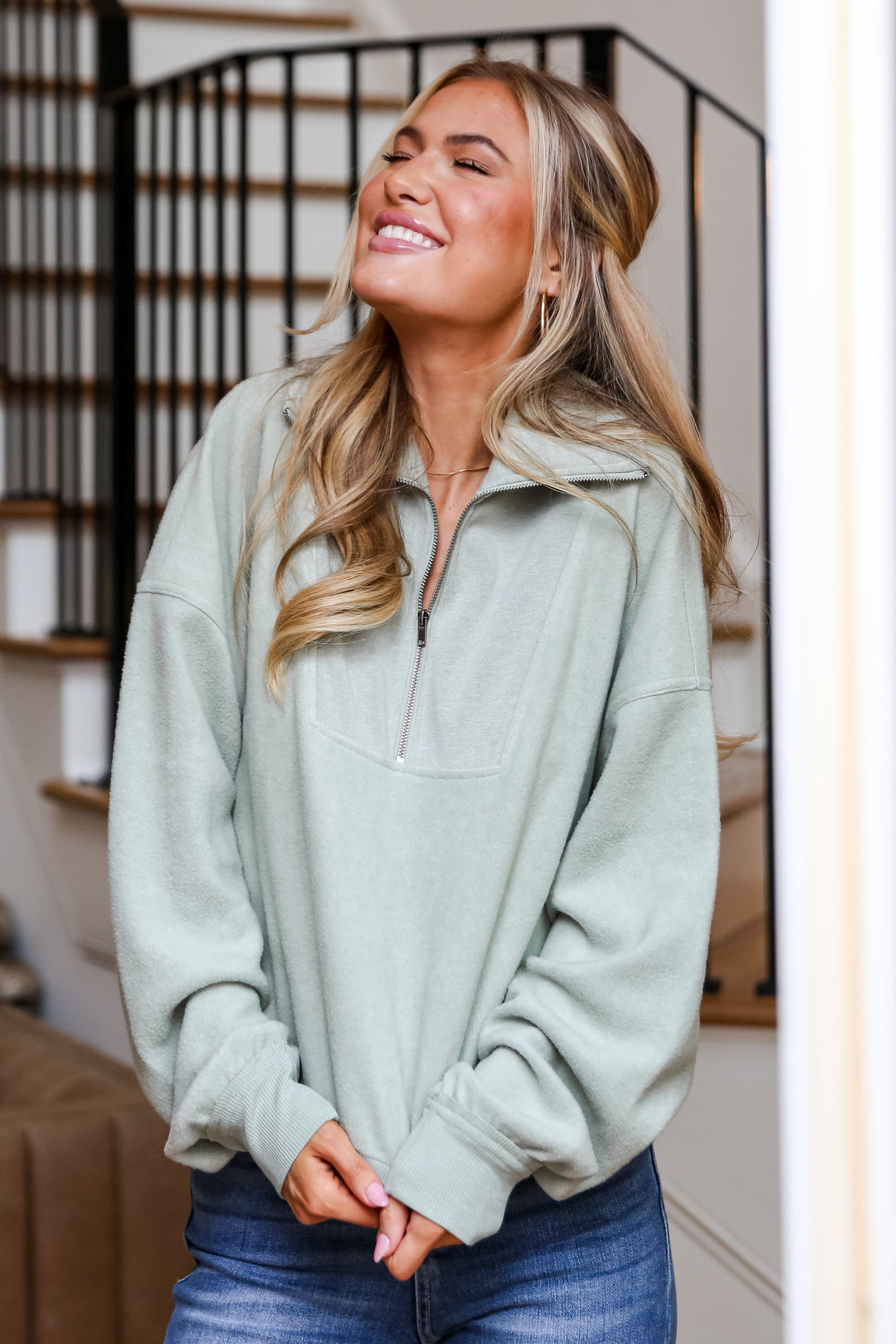 sage Fleece Quarter Zip Pullover on model