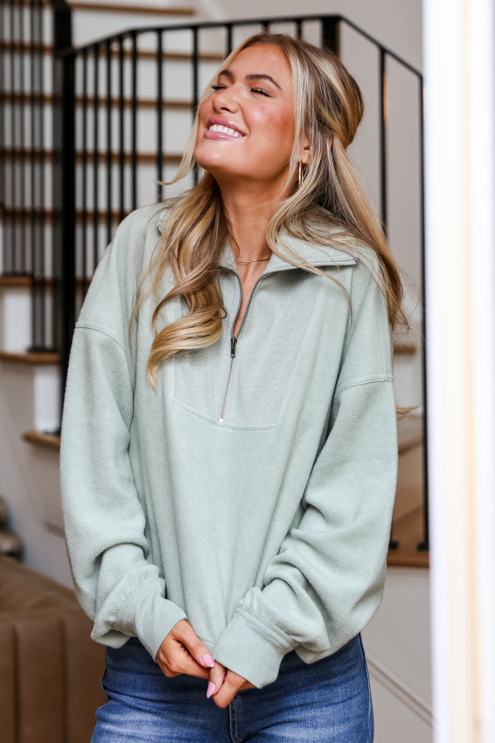 sage Fleece Quarter Zip Pullover on model