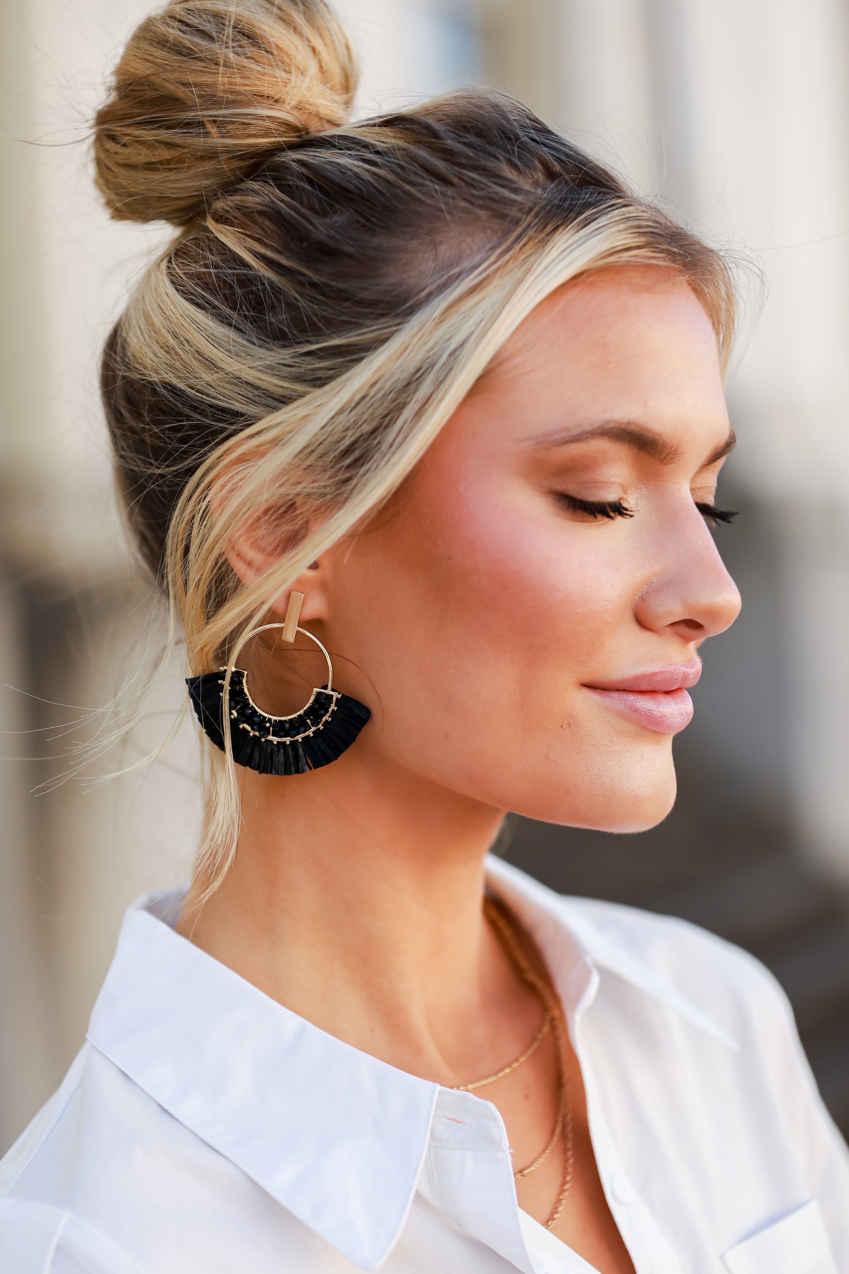 black Fringe Statement Earrings on model