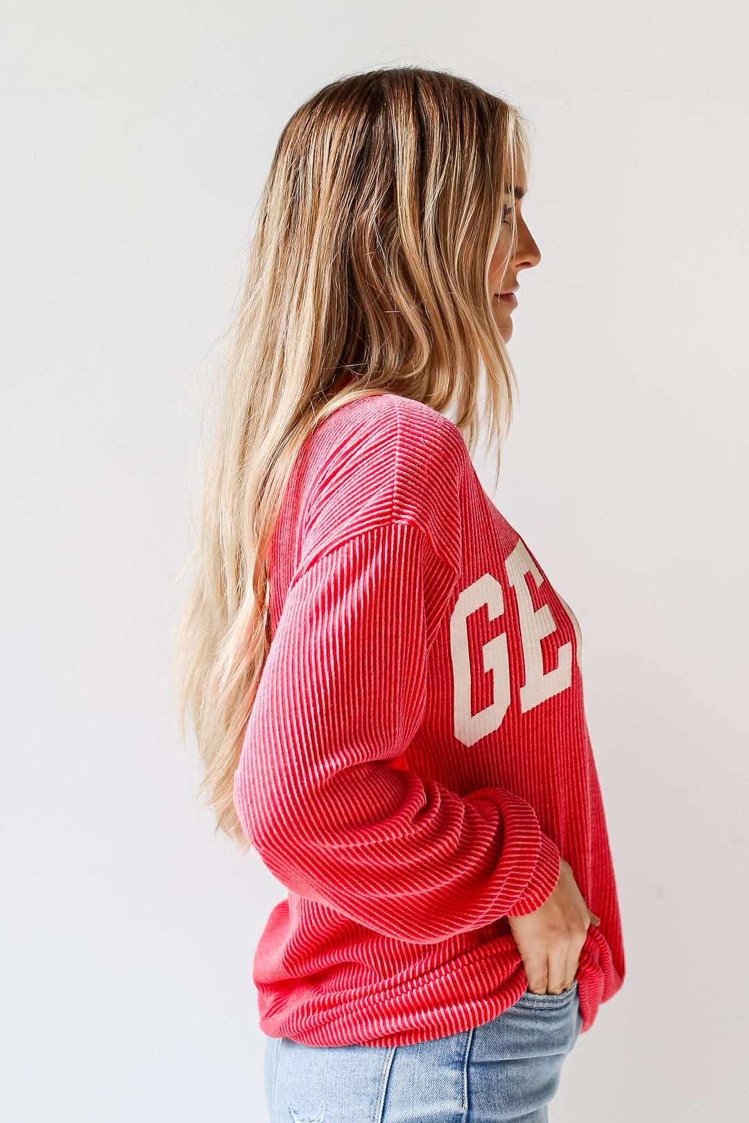 red corded sweatshirt