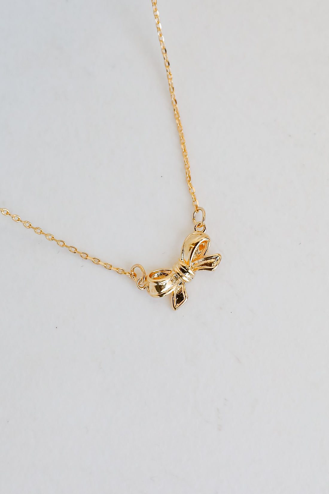 Brooke Gold Bow Charm Necklace