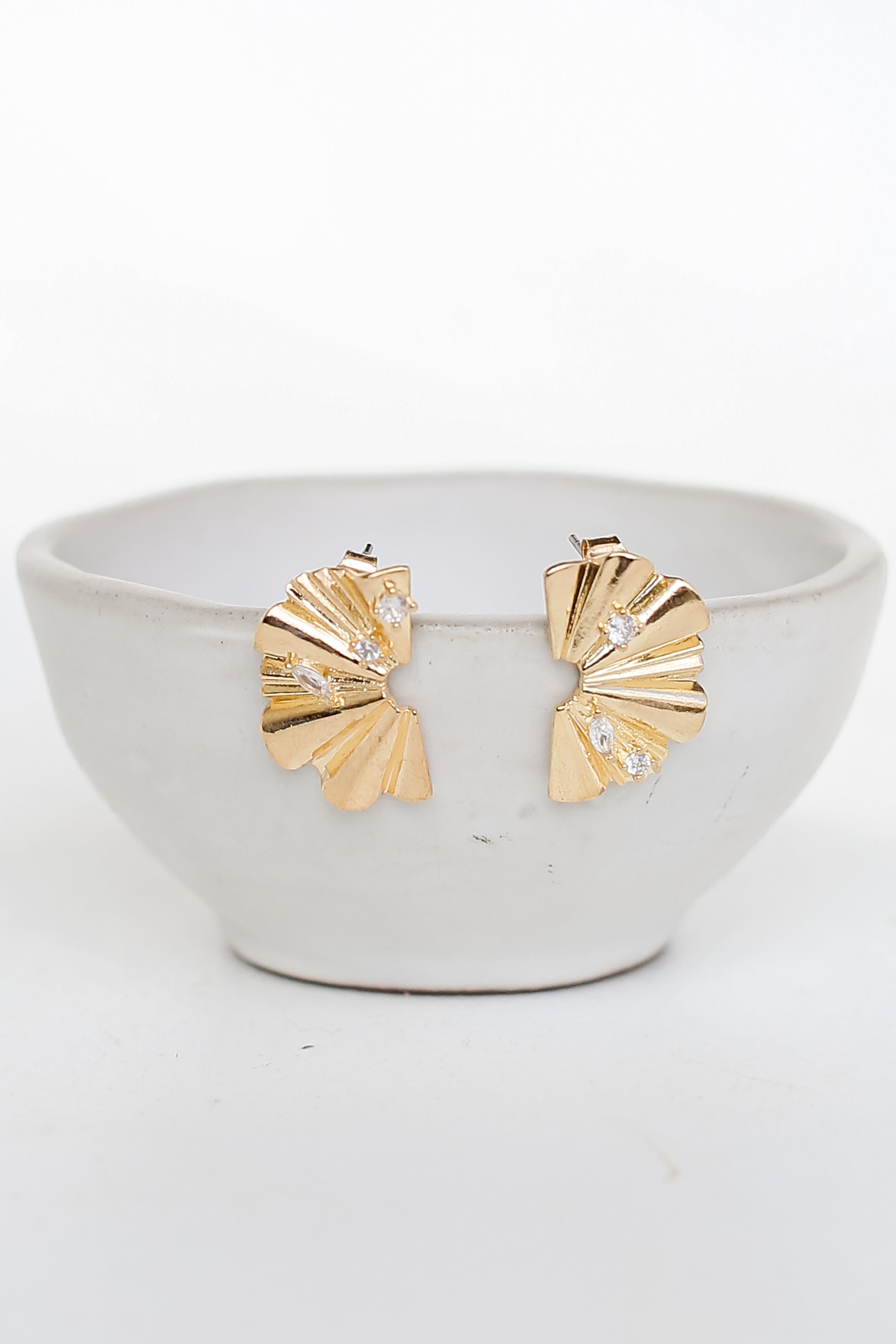 Gold Statement Stud Earrings flat lay