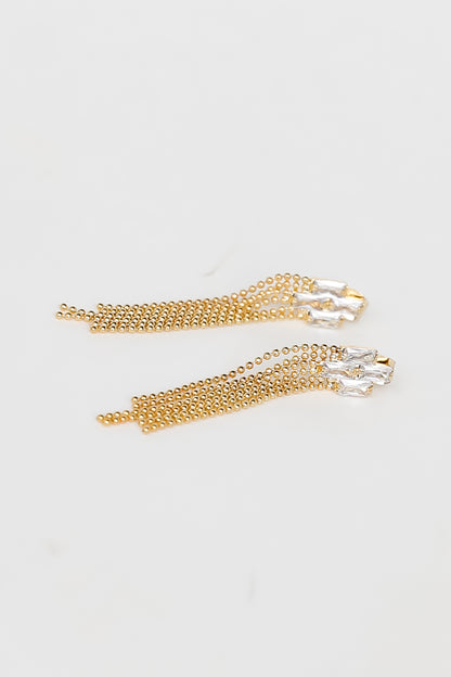 Gold Rhinestone Beaded Fringe Earrings flat lay