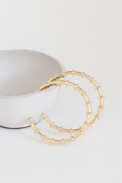 Gold Hoop Earrings flat lay