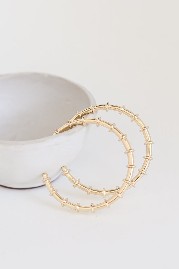 Gold Hoop Earrings flat lay