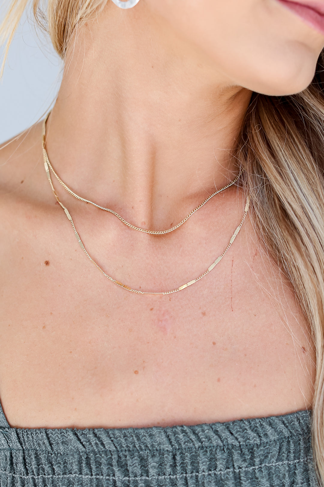 Gold Layered Chain Necklace on model