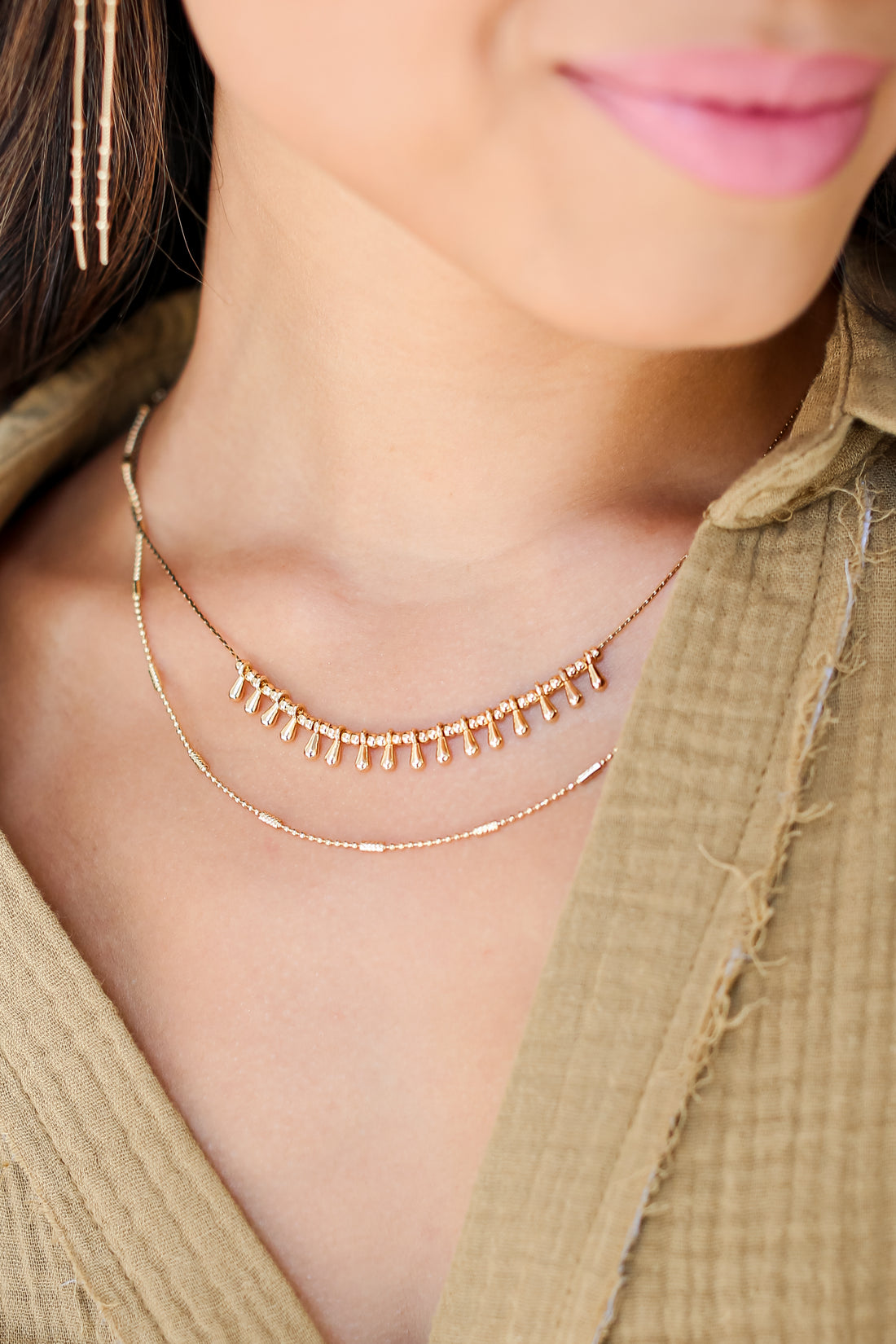 Gold Layered Chain Necklace on model