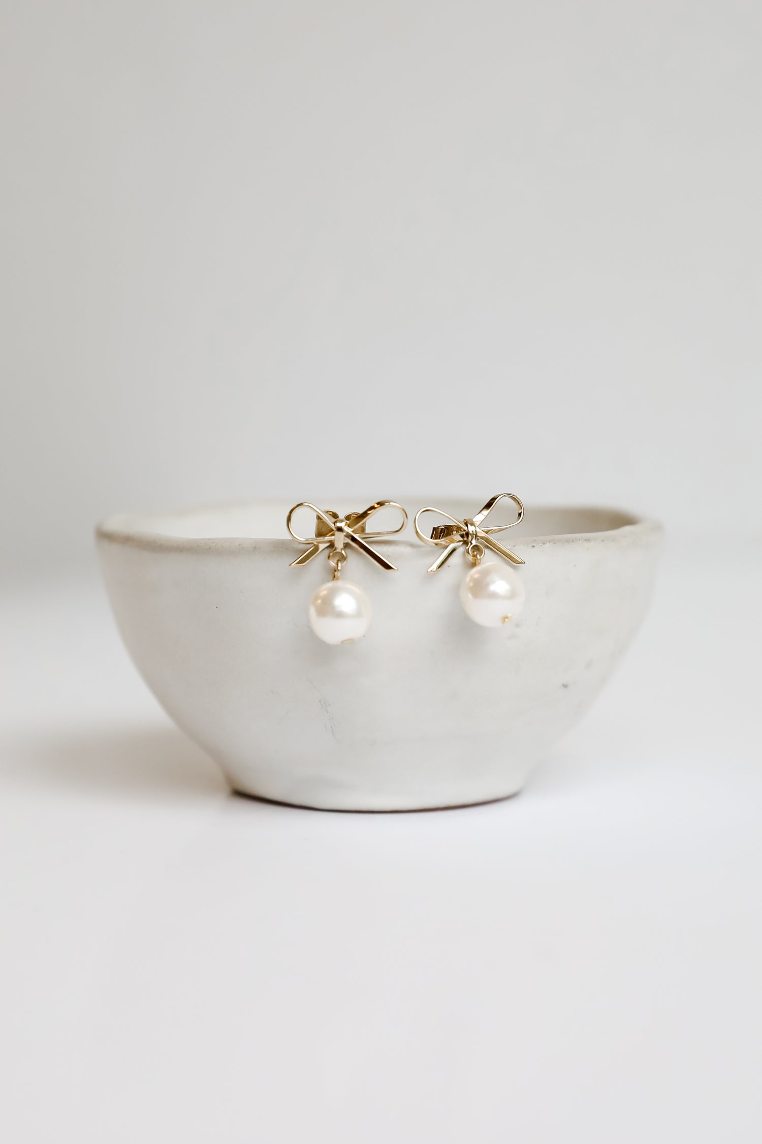 Daphne Gold Pearl Bow Stud Earrings