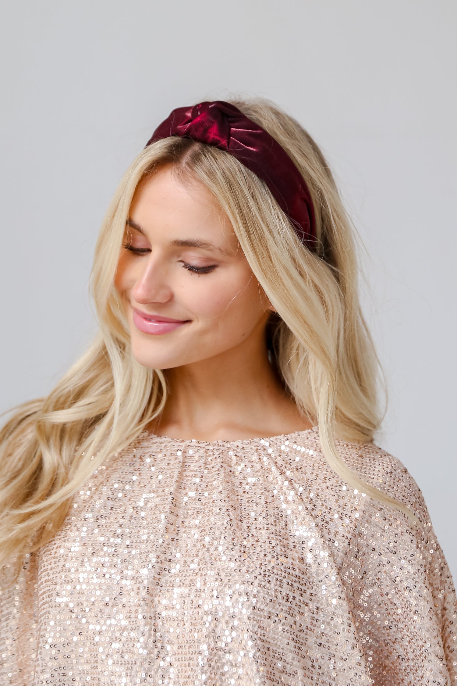 Wine Velvet Knotted Headband on model