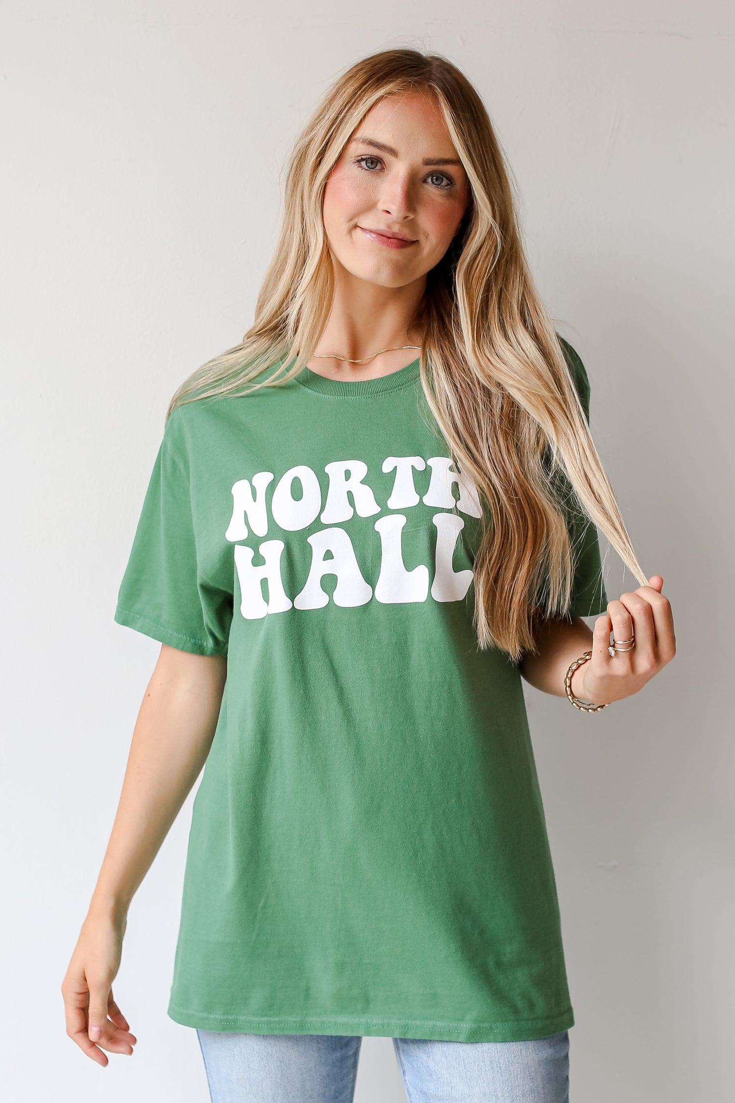 Green North Hall Tee on dress up model