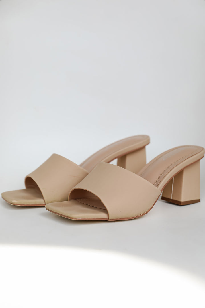 Elegant Elevation Nude Slide Heels