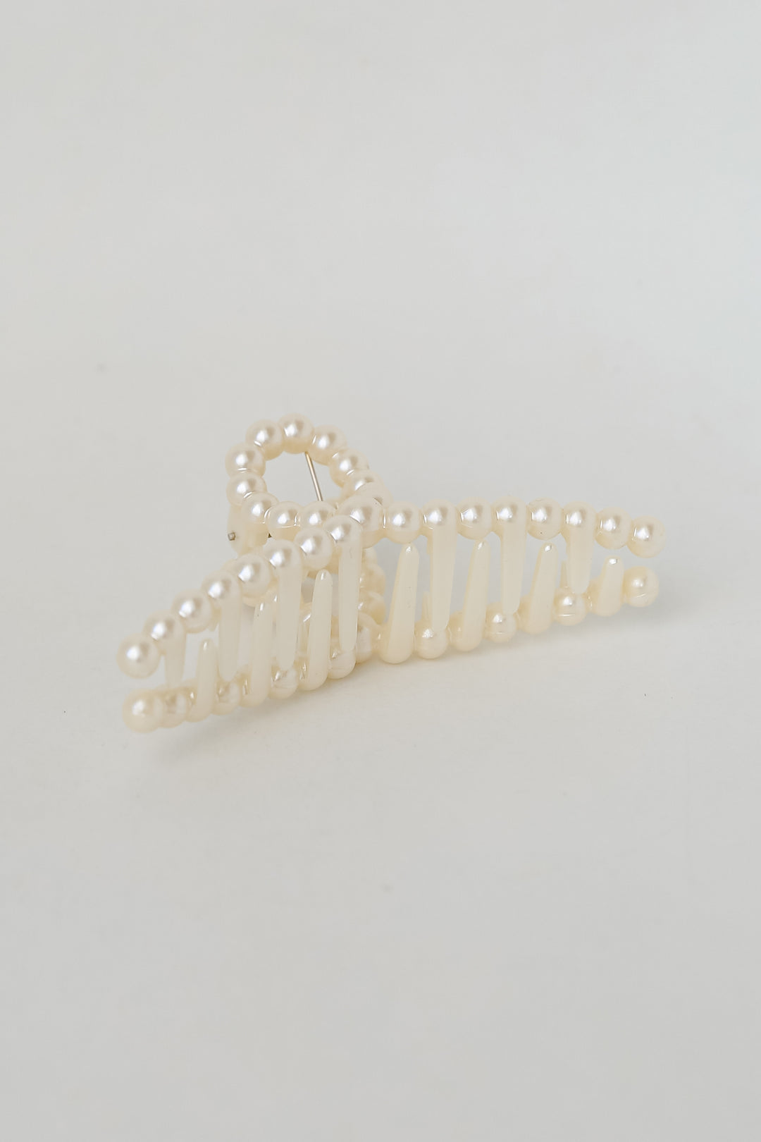 Pearl Claw Hair Clip flat lay