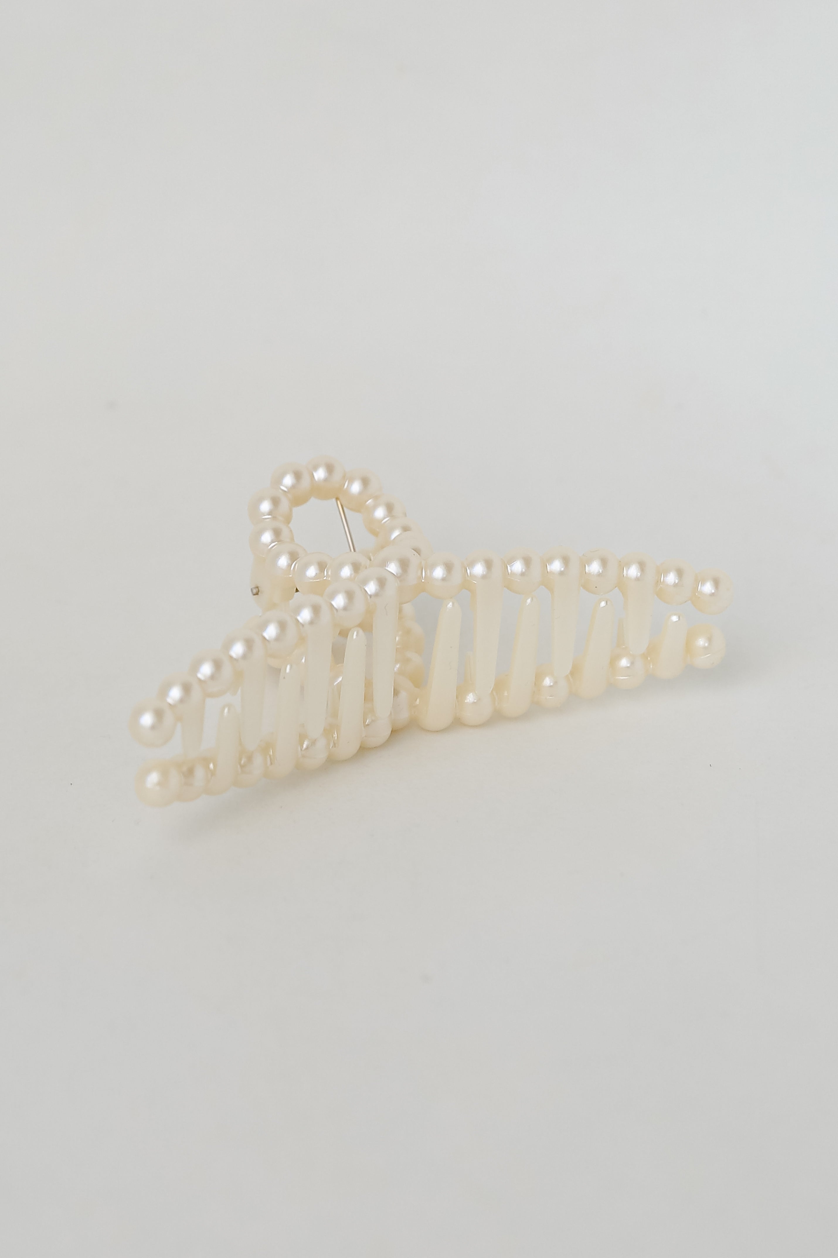 Pearl Claw Hair Clip flat lay