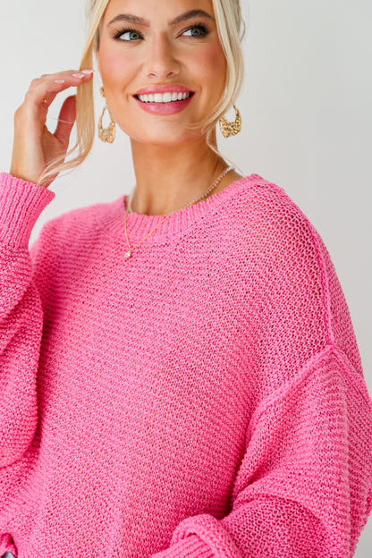 bright pink sweaters