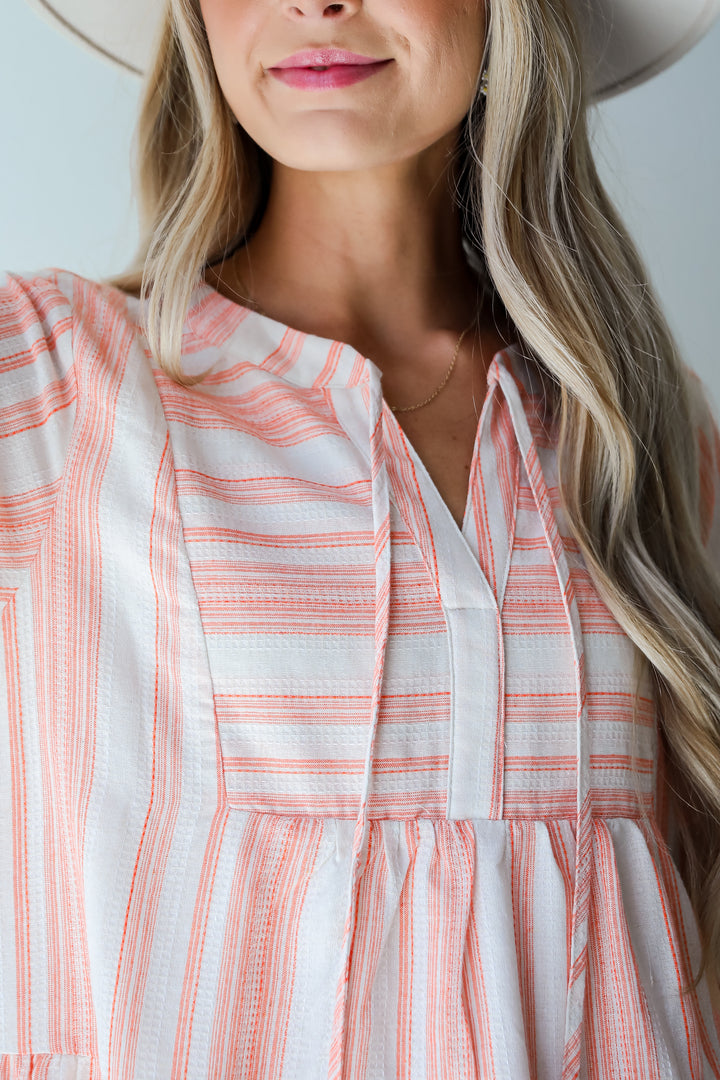 Sweet Tendencies Orange Striped Tiered Mini Dress