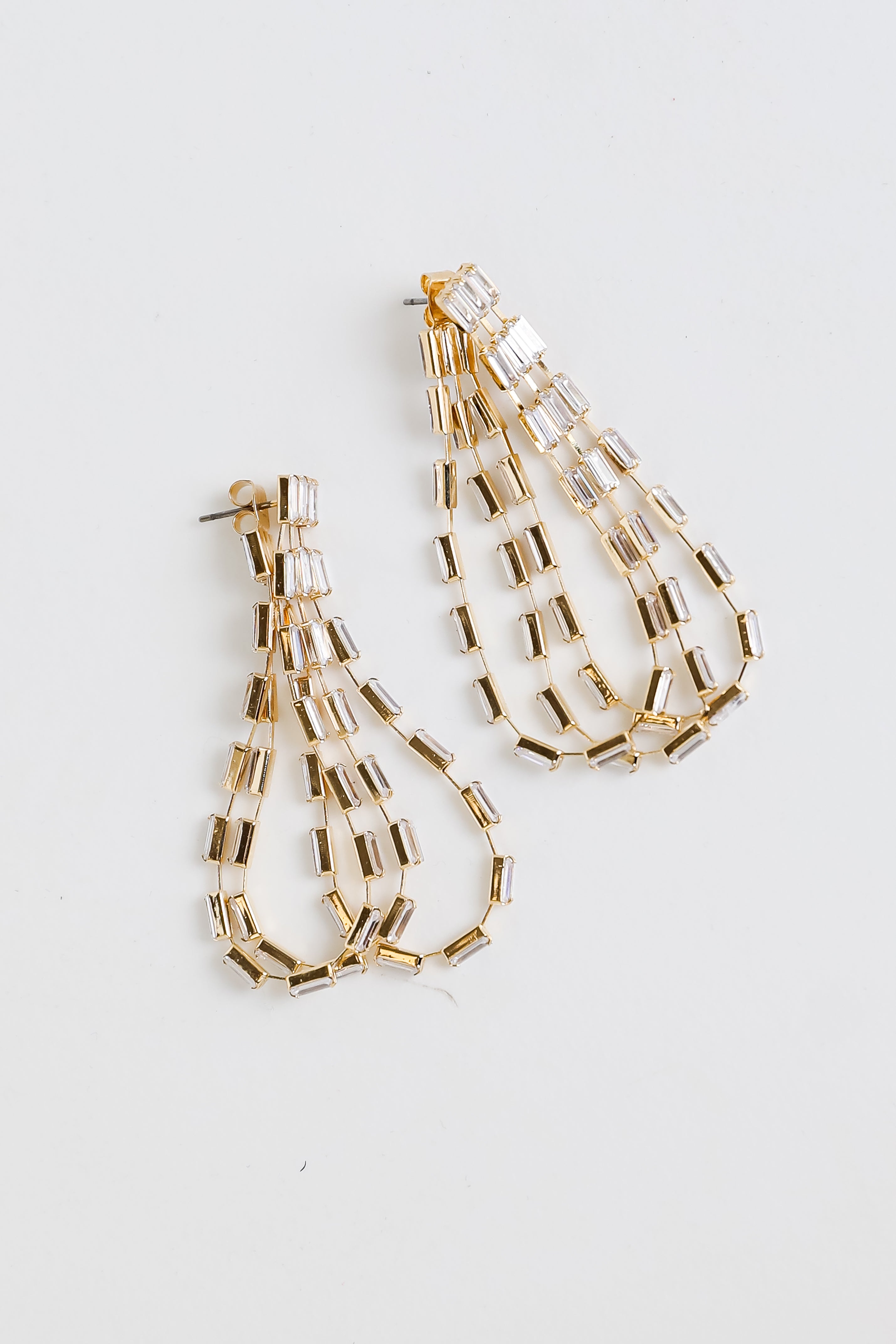 Gold Rhinestone Teardrop Hoop Earrings flat lay