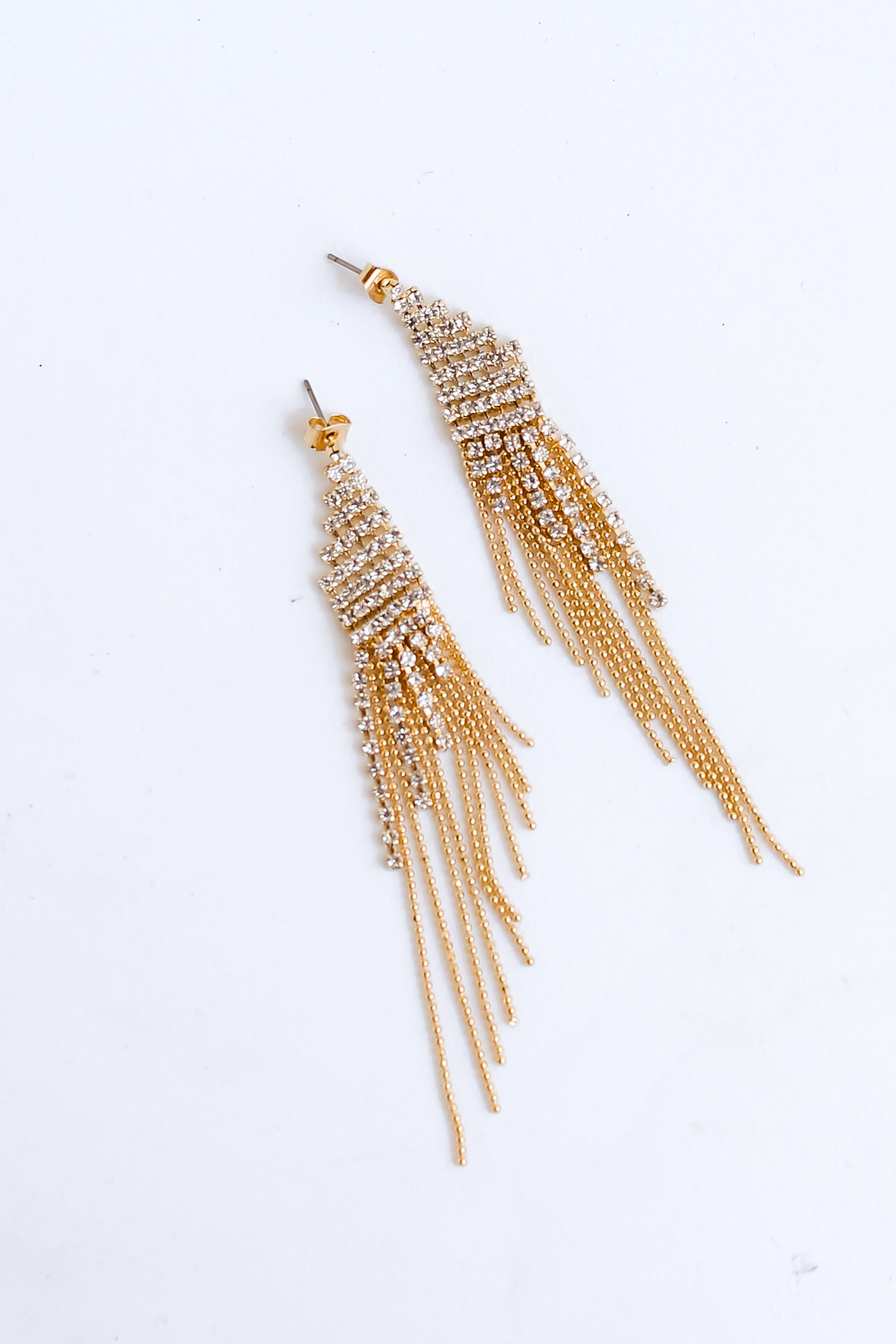 Gold Rhinestone Beaded Fringe Earrings flat lay