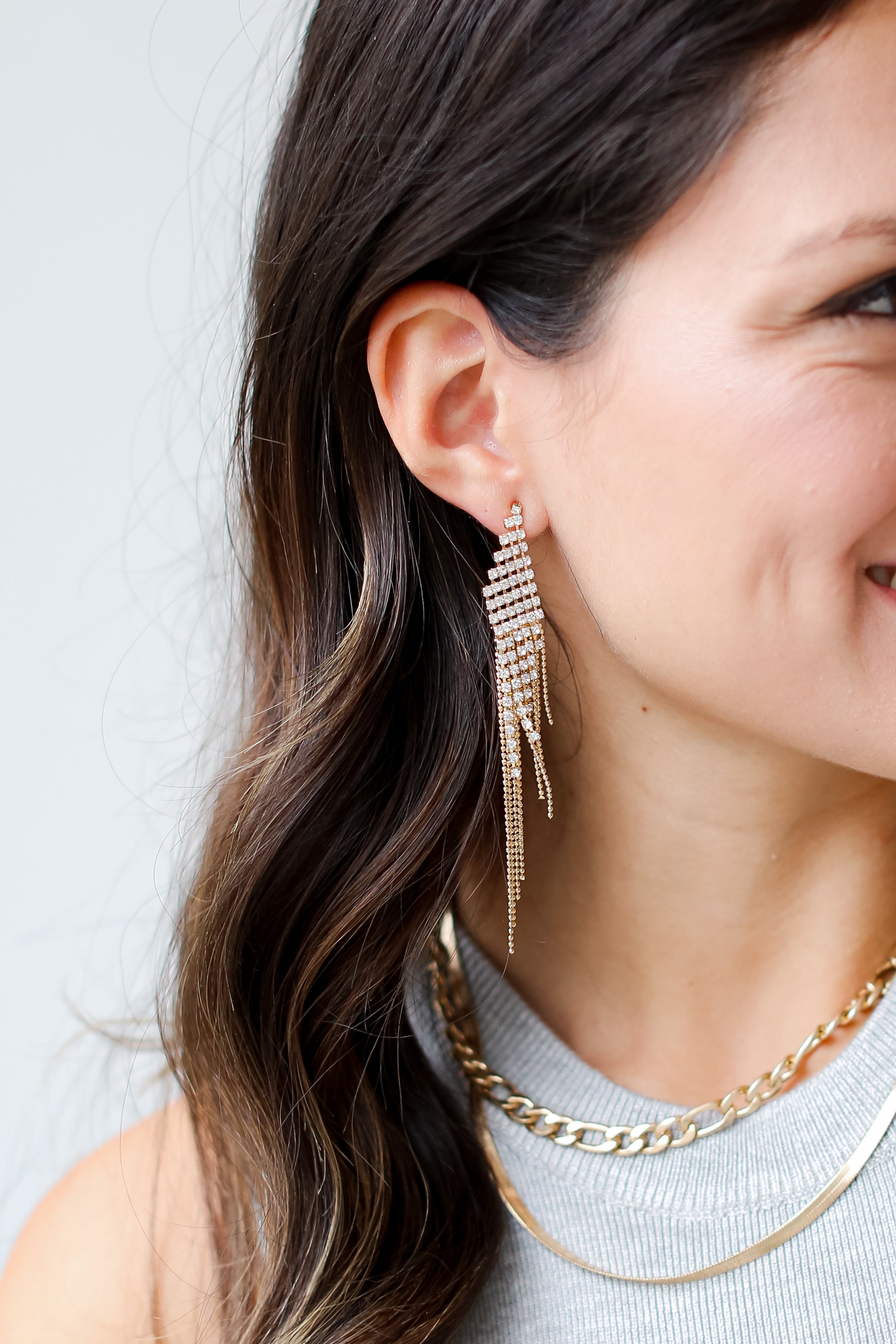 Gold Rhinestone Beaded Fringe Earrings on model