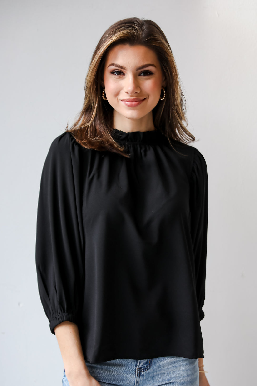 black ruffle top