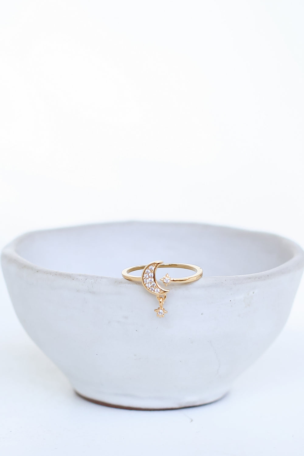 Gold Rhinestone Moon + Star Ring flat lay