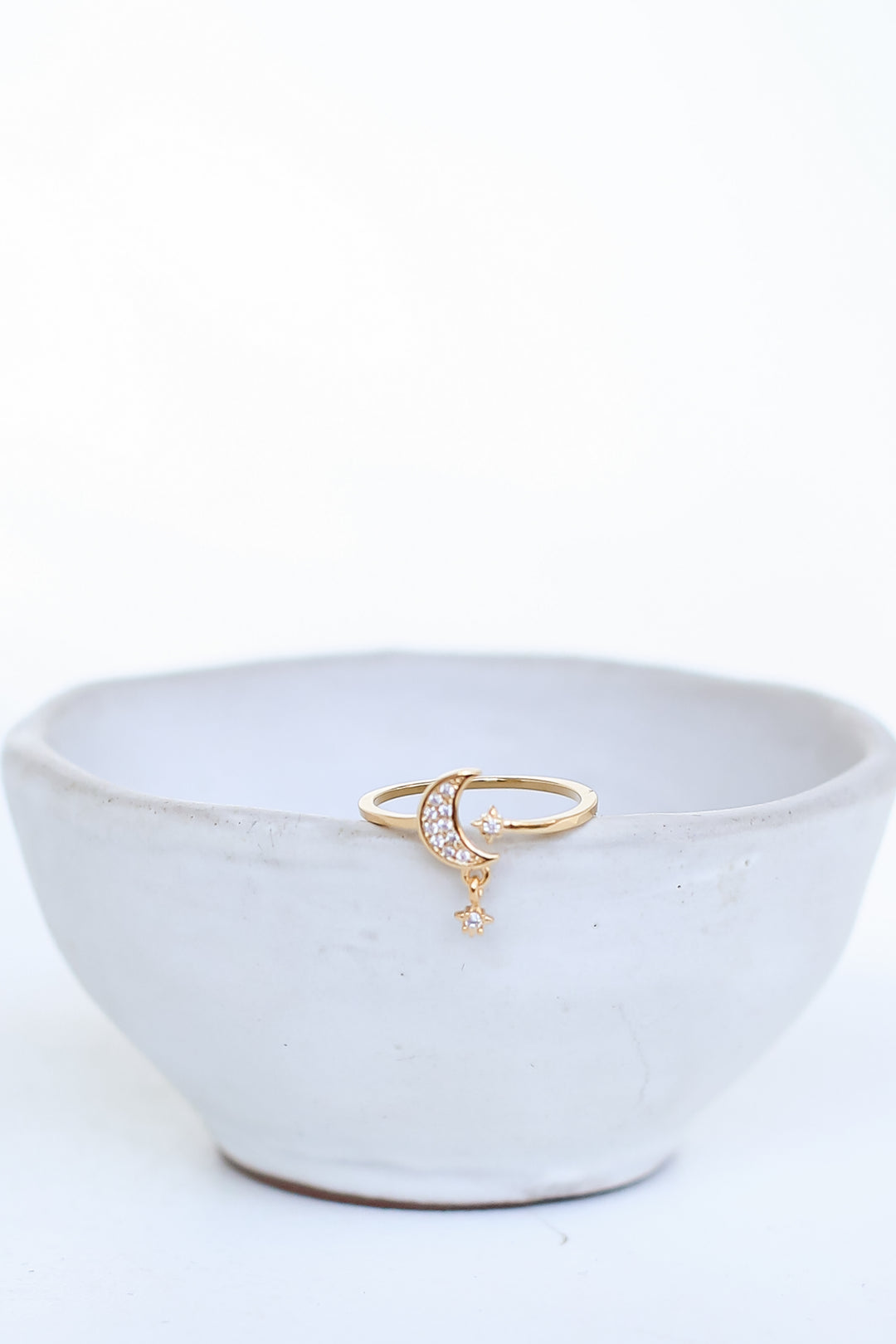 Gold Rhinestone Moon + Star Ring flat lay