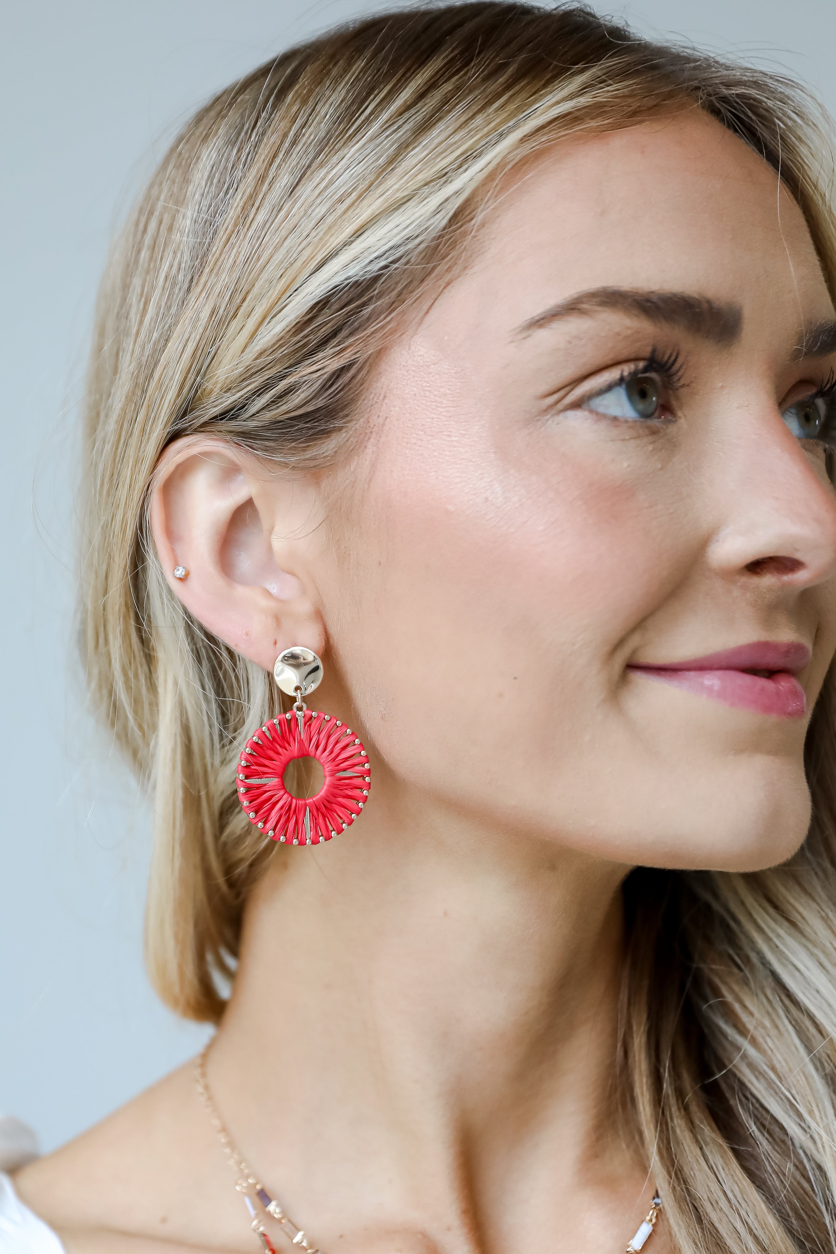 red straw earrings