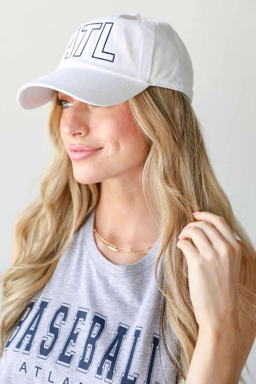 white ATL Vintage Embroidered Hat on model