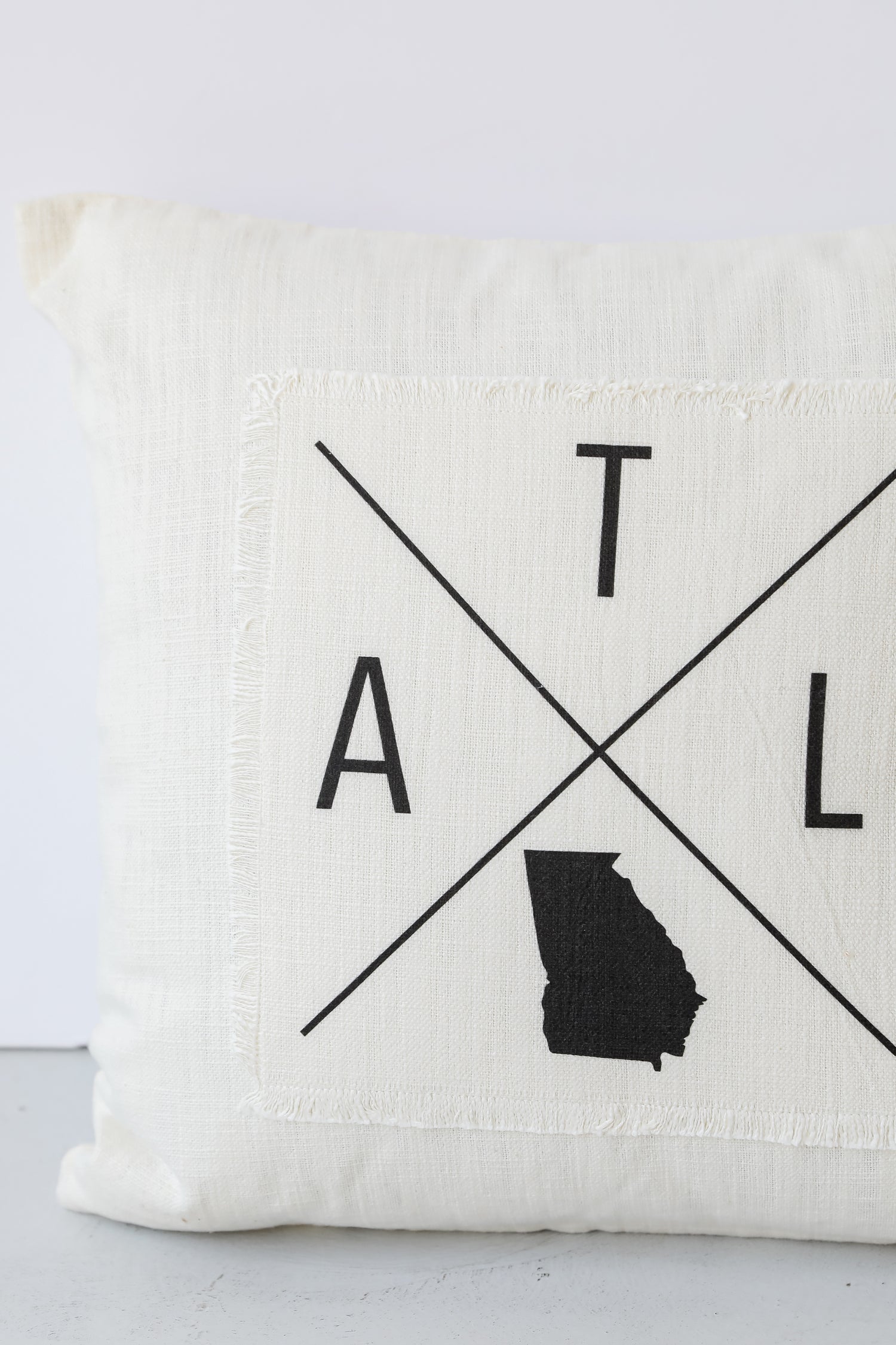 Atlanta Cross Pillow close up