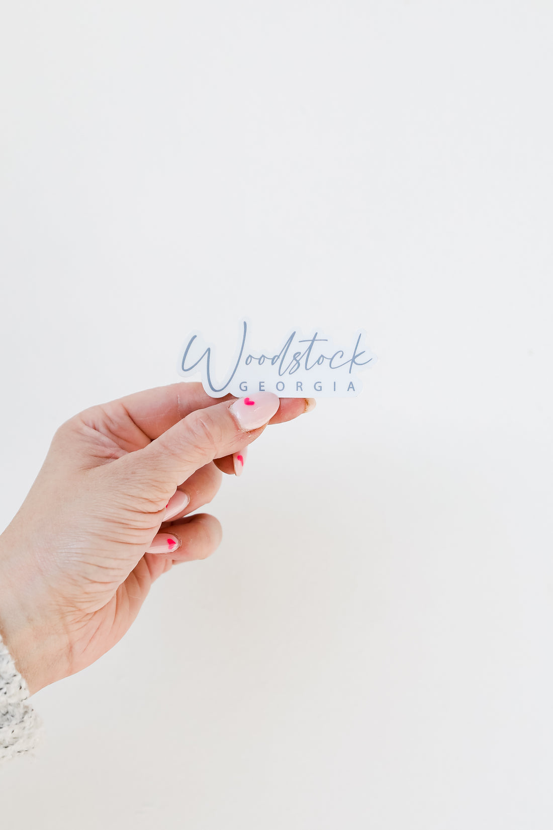 Woodstock Georgia Script Sticker flat lay