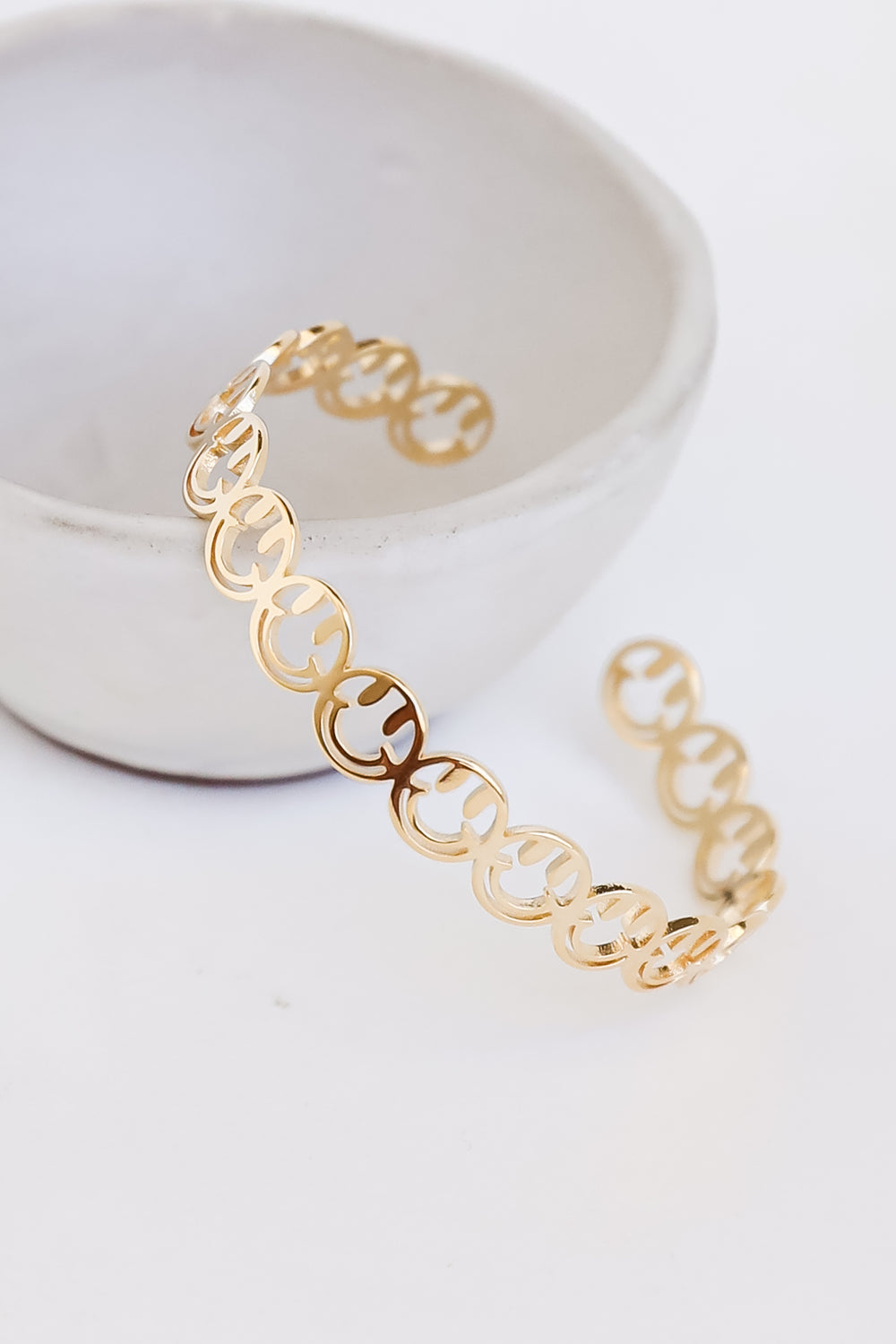 Gold Smiley Face Cuff Bracelet close up