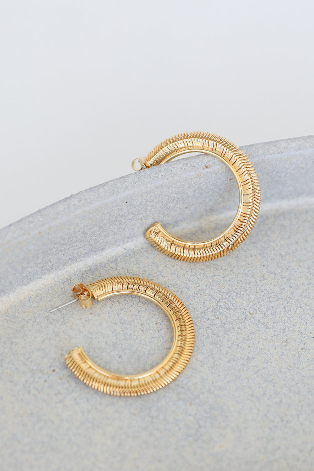 Gold Snake Chain Hoop Earrings flat lay