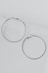 Hammered Hoop Earrings in gold flat lay