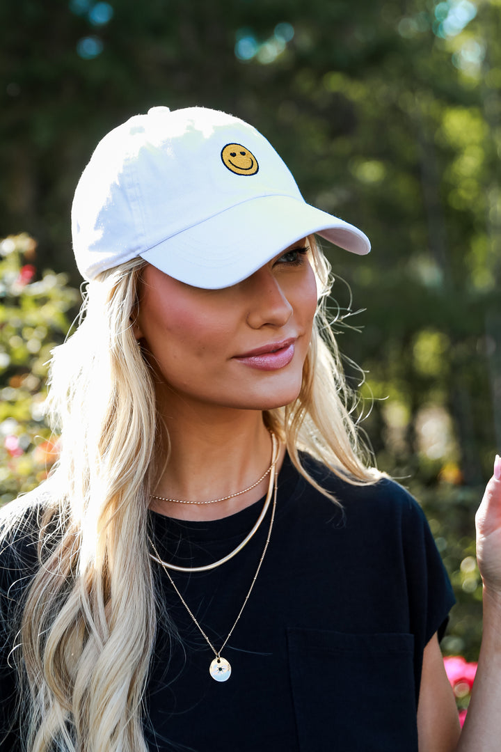 Smiley Face Baseball Hat in white on model