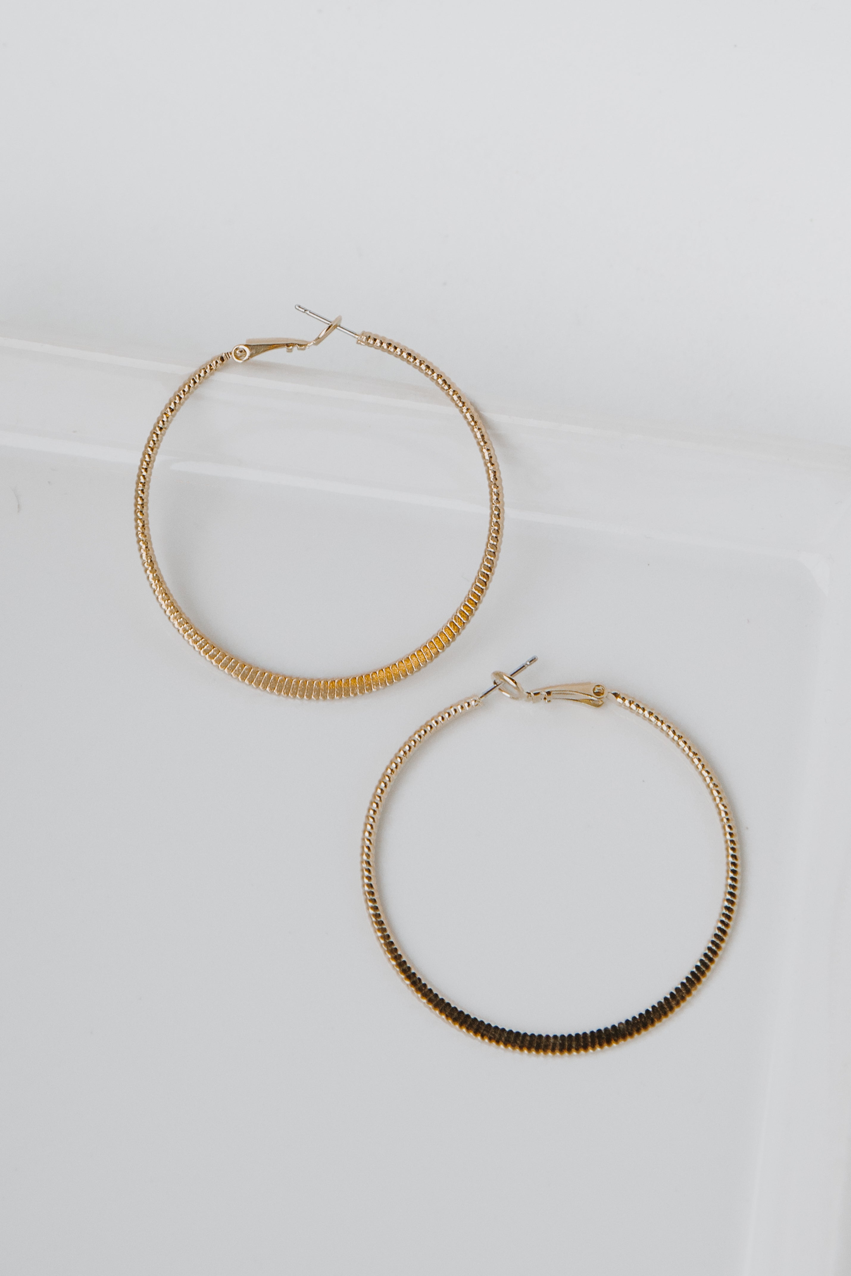 Gold Textured Small Hoop Earrings from dress up