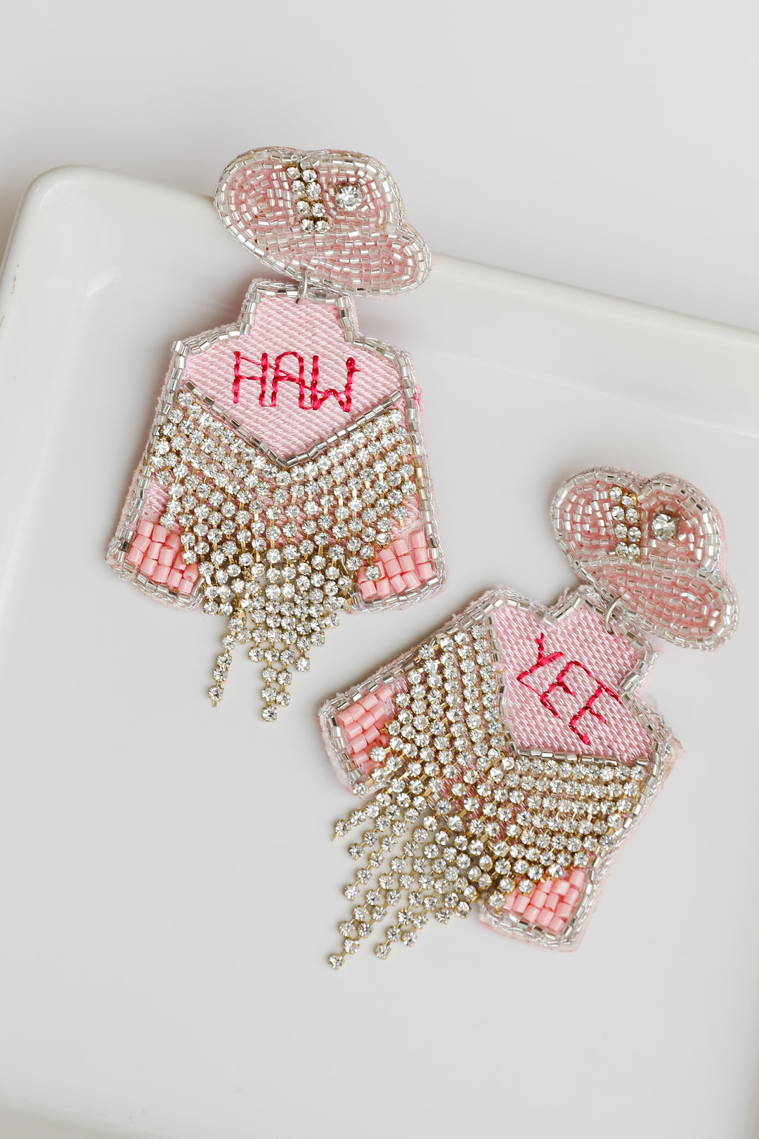 flat lay of Yeehaw Beaded Rhinestone Fringe Earrings